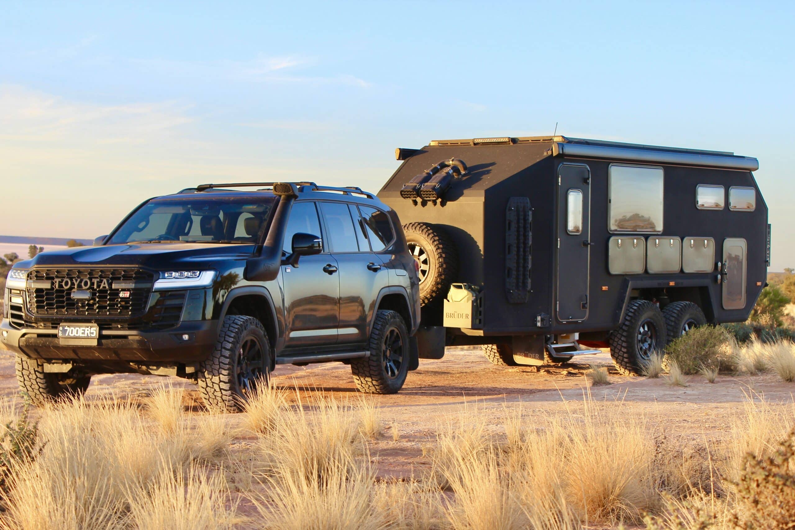 Bruder-EXP-8-with-Car-outback-sunset